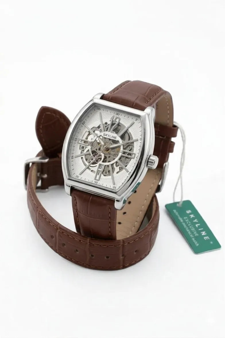 Luxury silver skeleton dial watch for men with leather band.