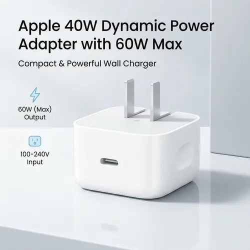 Apple 40W Dynamic Power Adapter with USB-C port and 60W maximum output, compact fast charging wall charger with universal 100–240V input.