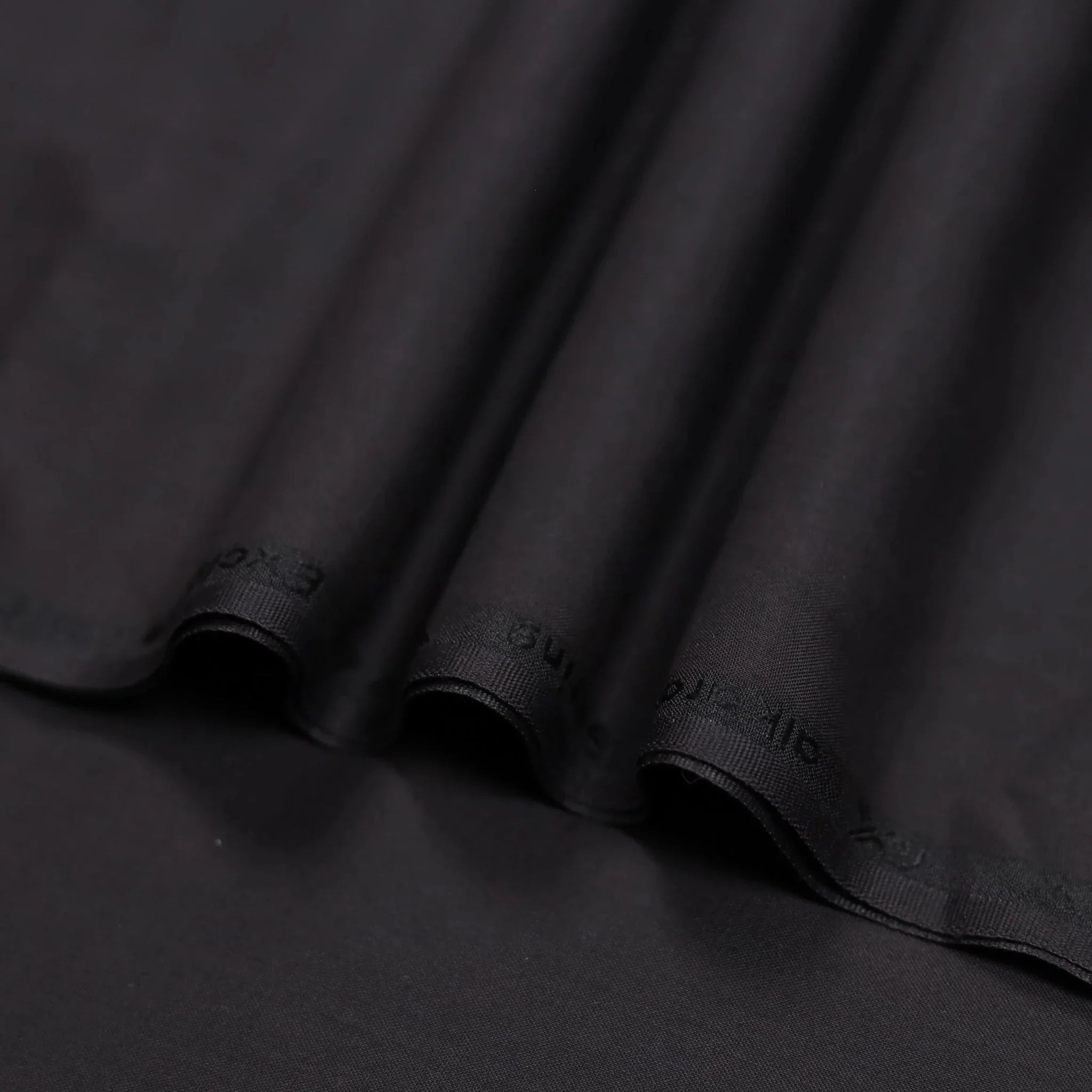 China Boski Black premium fabric with a soft and luxurious finish for men's shalwar kameez.