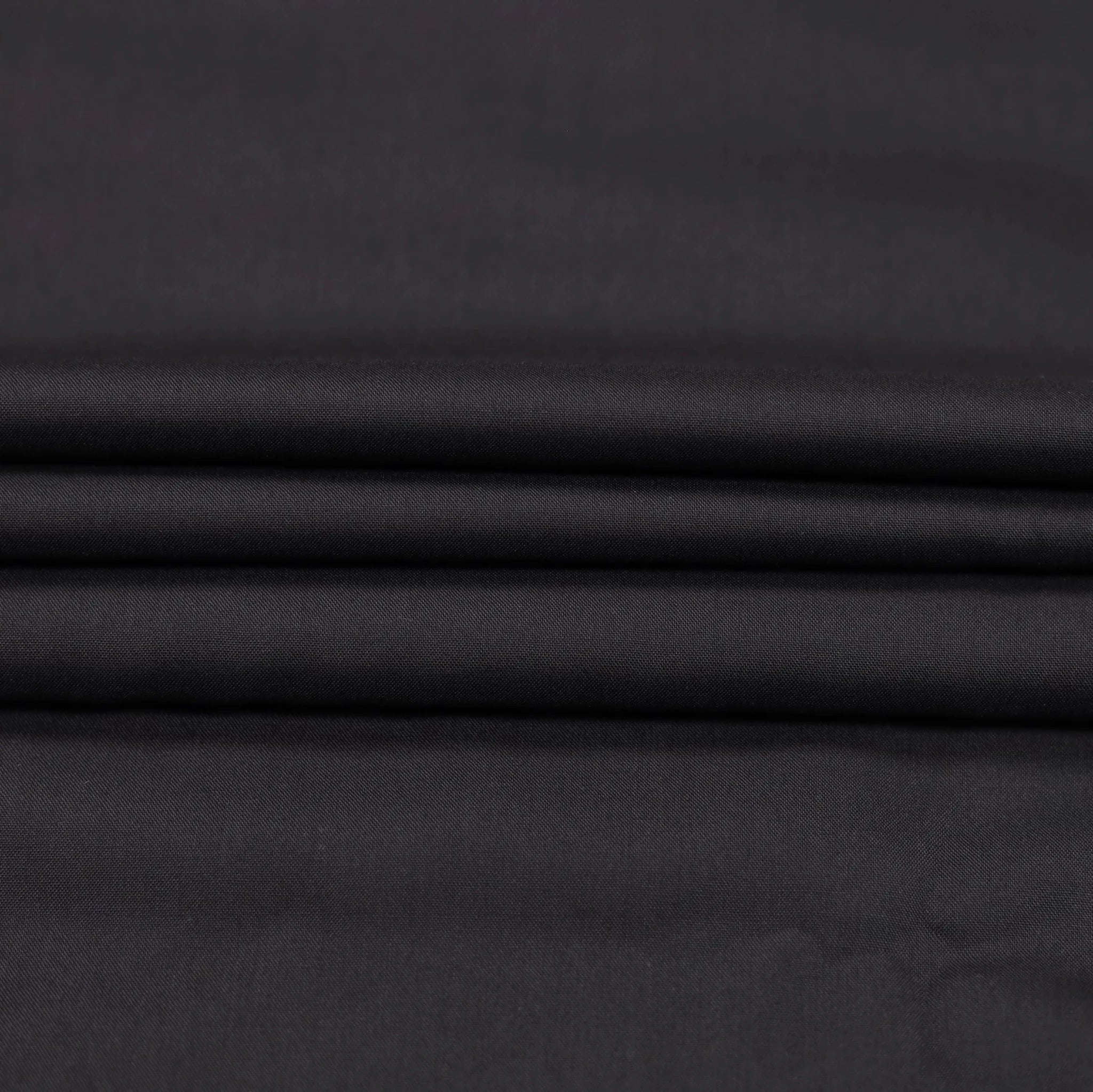 Elegant black China Boski fabric featuring a smooth texture and premium quality.
