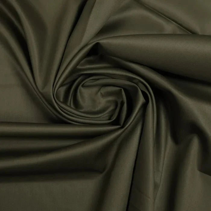 remium Cotton Fabric in Mehndi green color featuring a soft, breathable, and lightweight texture, ideal for stitching men's shalwar kameez for casual, formal, festive, and everyday wear.