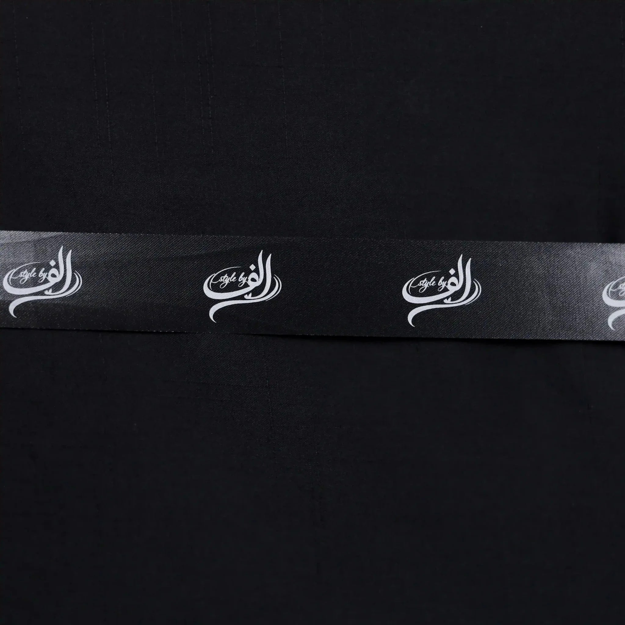 Men's Wash & Wear Self Textured Black Suit premium fabric.
